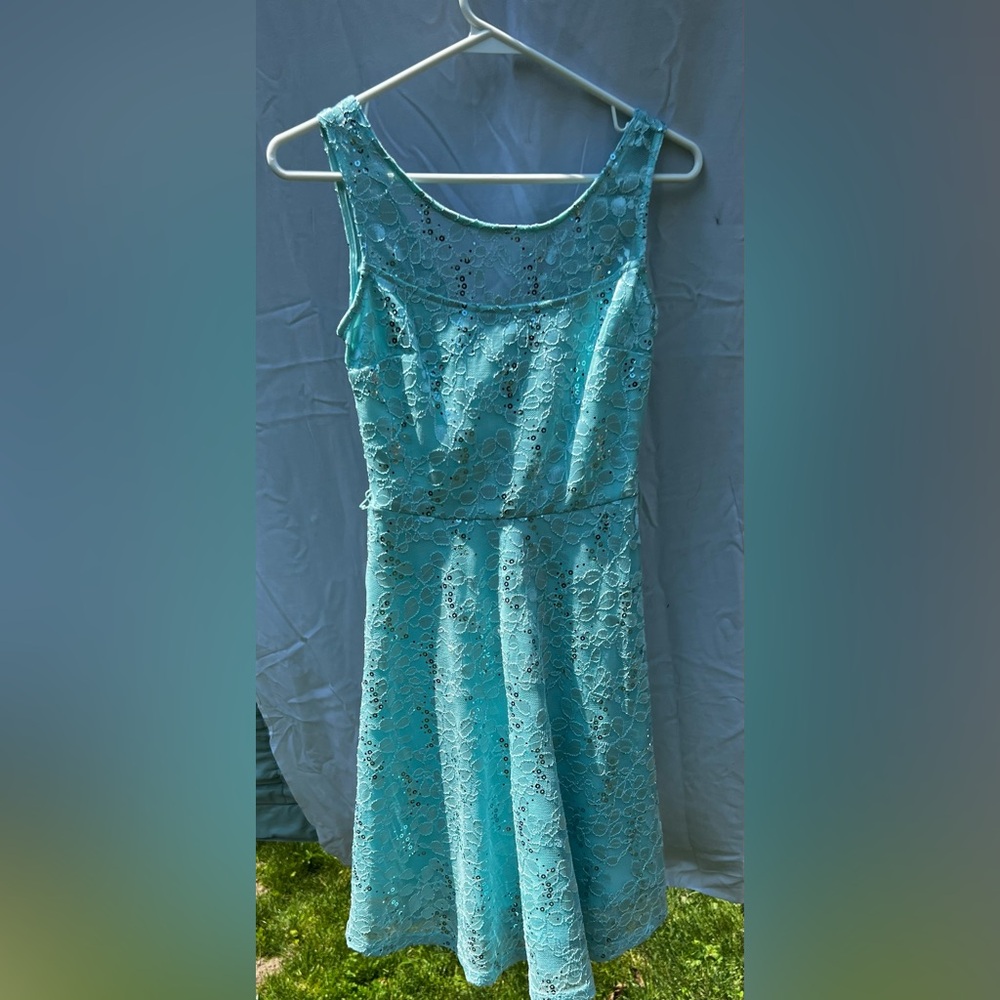Le Chateau, teal grad dress. worn to elementary school graduation. worn once.